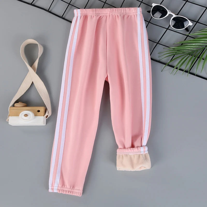 Autumn and winter children's solid color sports plus velvet pants boys and girls comfortable leisure warm sports fashion pants.